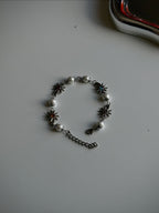 Daisy Sun bracelet.
